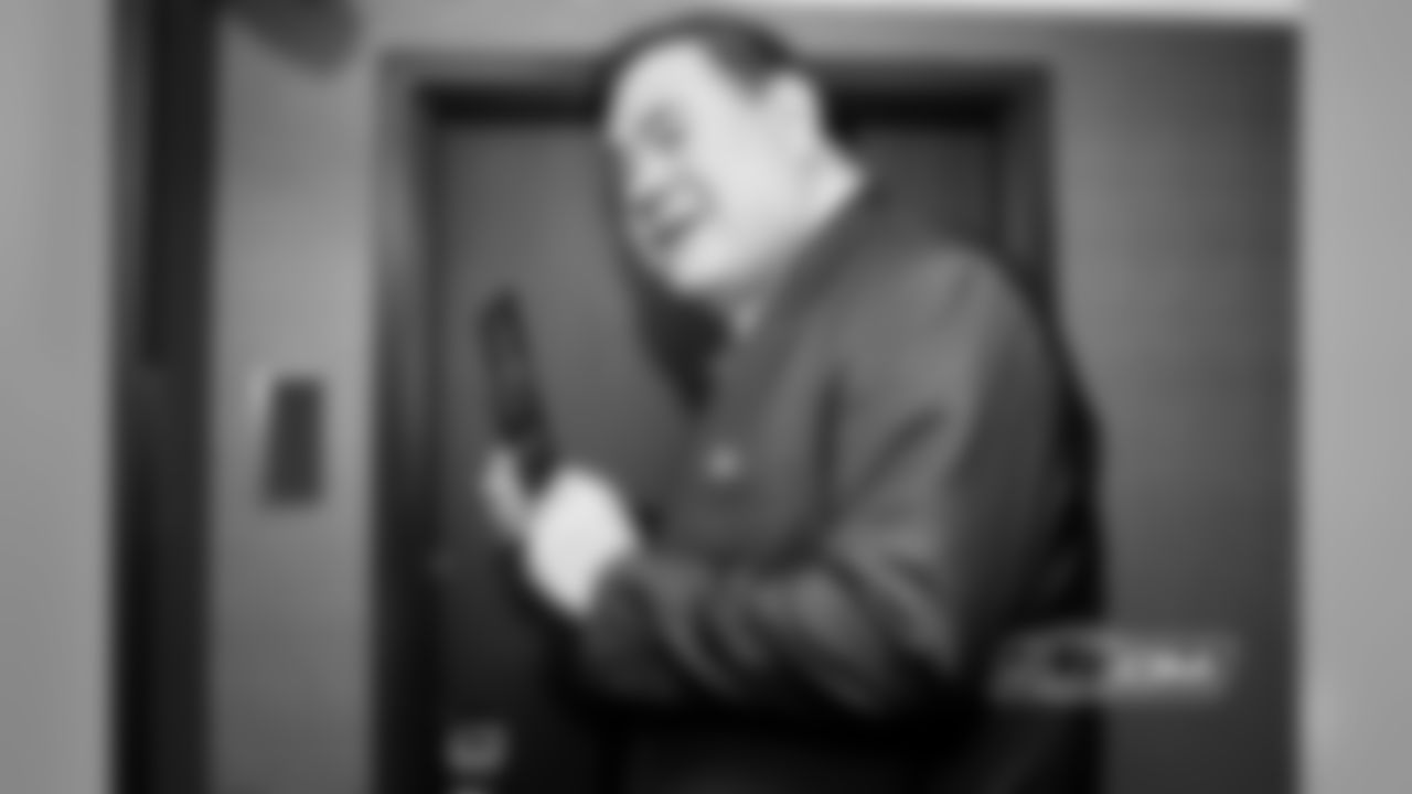 Pro Football Hall of Fame David Baker stops at Brian Urlacher's hotel room door.