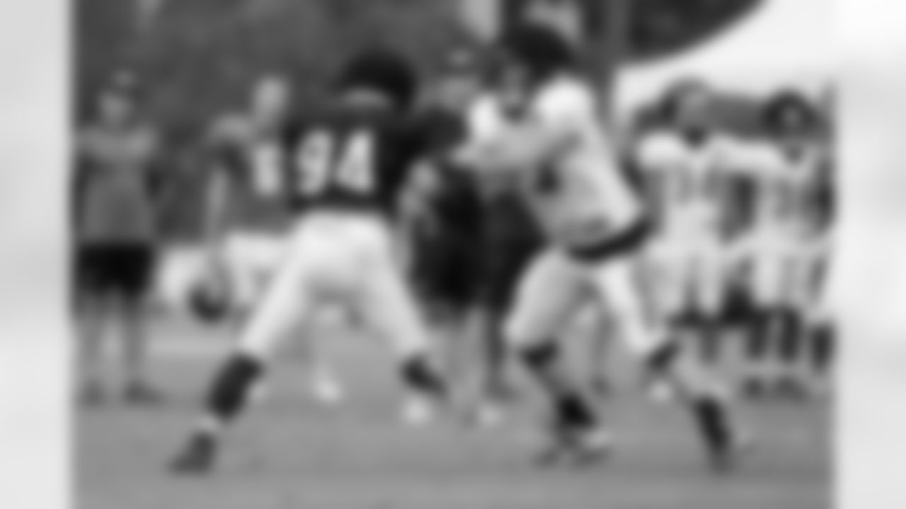 OT Jonah Williams (right) against DE Sam Hubbard during training camp at the Kettering Health Practice Fields on Wednesday, August 16, 2023 in Cincinnati, Ohio.