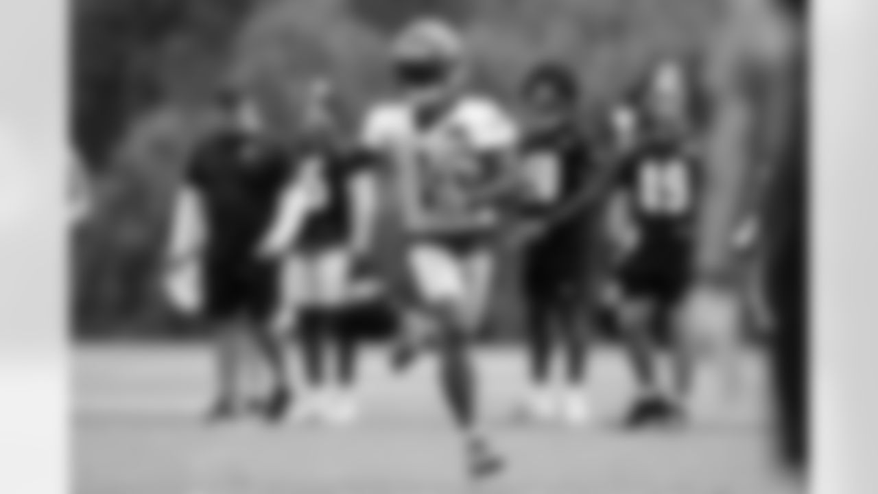 WR Ja'Marr Chase holds up a number one while running the ball during the first day of Bengals Training Camp 2023 at Kettering Health Practice Fields on Wednesday, July 26 2023 in Cincinnati, Ohio.
