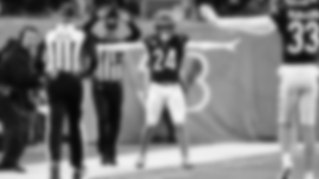 S Vonn Bell celebrates after breaking up a pass against the Las Vegas Raiders in the second half of the AFC Wild Card game.