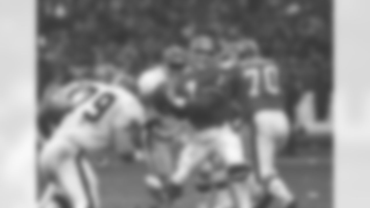 Denver Broncos quarterback John Elway prepares to send the ball downfield en route to a 23-20 overtime victory Jan. 12, 1987 in the AFC Championship game against the Cleveland Browns, in Cleveland. Elway's performance in leading Denver on a 98-yard game-tying possession known as "The Drive" in the final minutes would cement his status as a star, and the Broncos would go on to win the game in overtime to send them to the Super Bowl. (AP Photo)