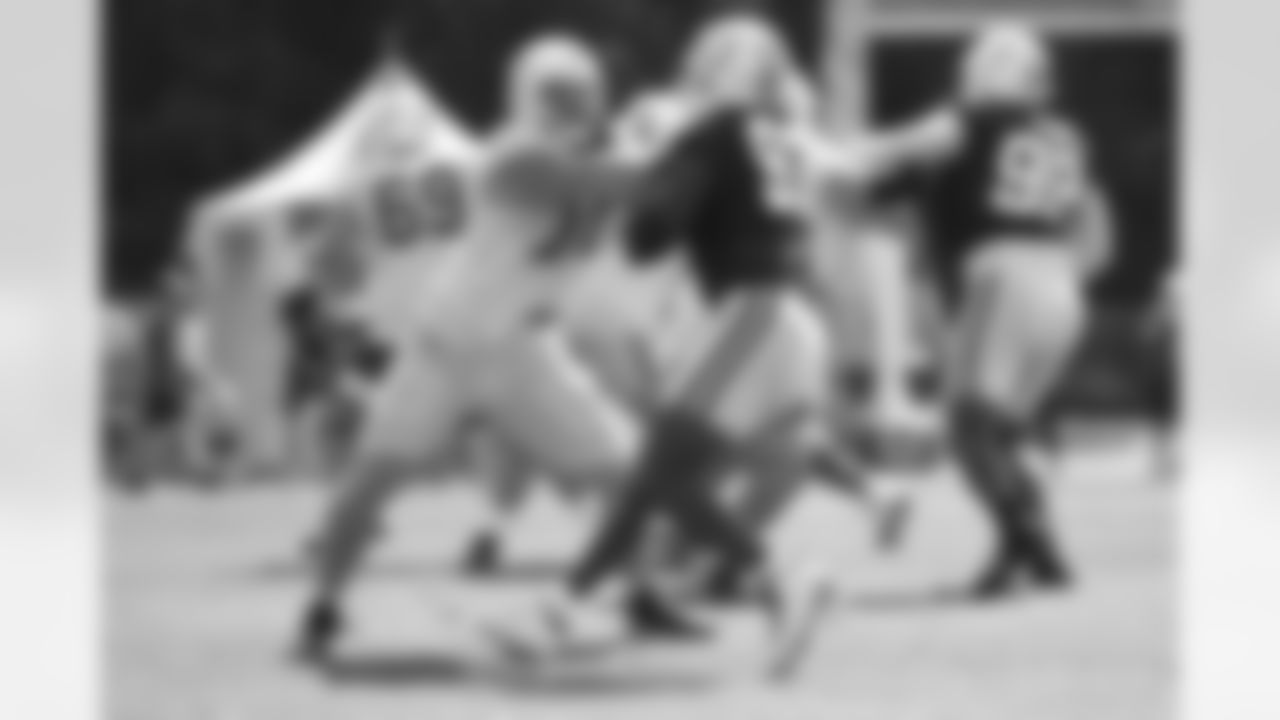 72 T/G Braden Smith, #97 DE Al-Quadin Muhammad