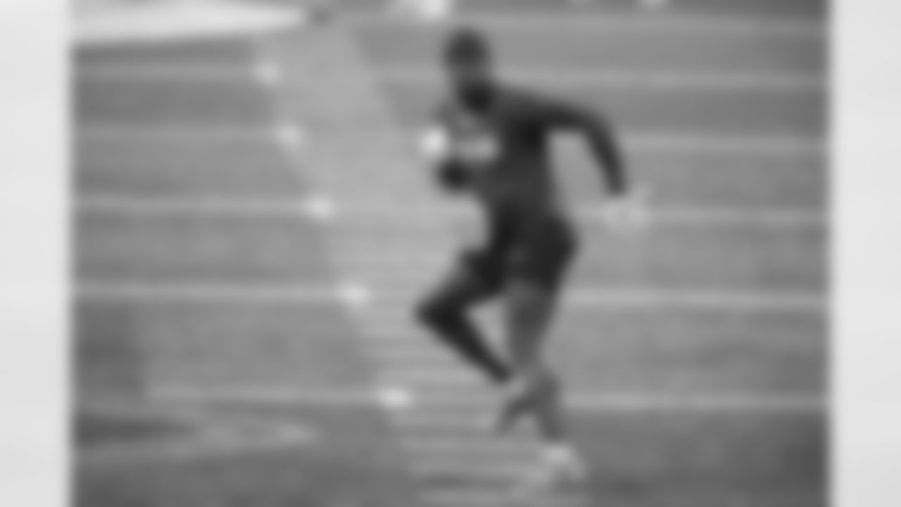 Houston defensive back Gervarrius Owens runs a drill at the NFL football scouting combine in Indianapolis, Friday, March 3, 2023. (AP Photo/Michael Conroy)