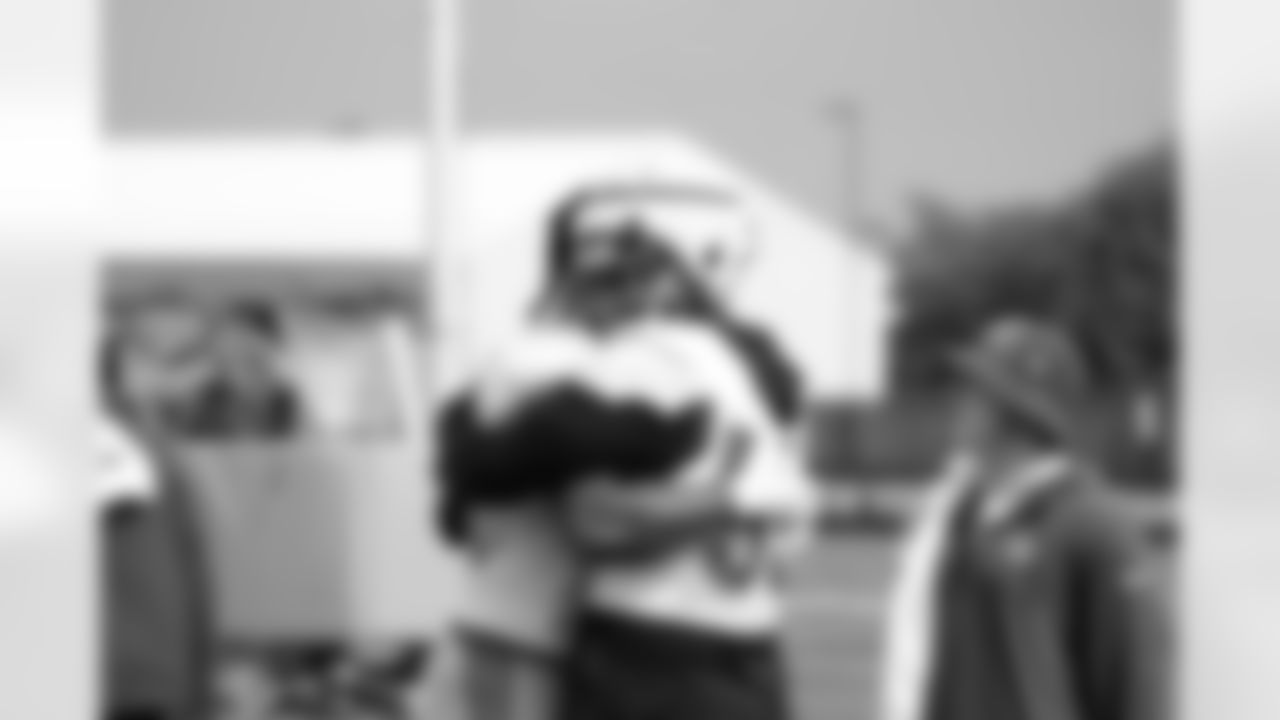 New York Giants defensive end Leonard Williams (99) and Jihad Ward (55) hug during training camp practice on August 21, 2023 in East Rutherford, NJ (Evan Pinkus/New York Giants)