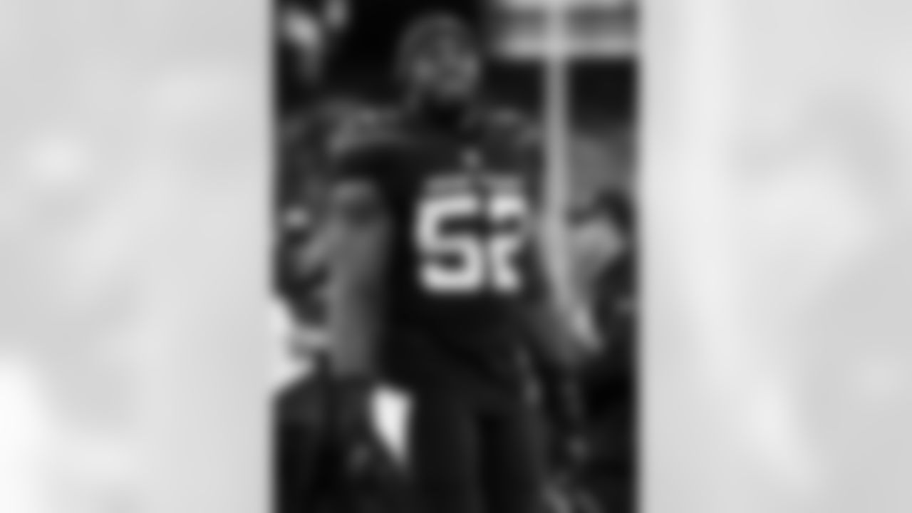 New York Jets middle linebacker Jarrad Davis (52) walks off the field after an NFL football game against the Philadelphia Eagles, Sunday, Dec. 5, 2021, in East Rutherford, N.J. (AP Photo/Adam Hunger)