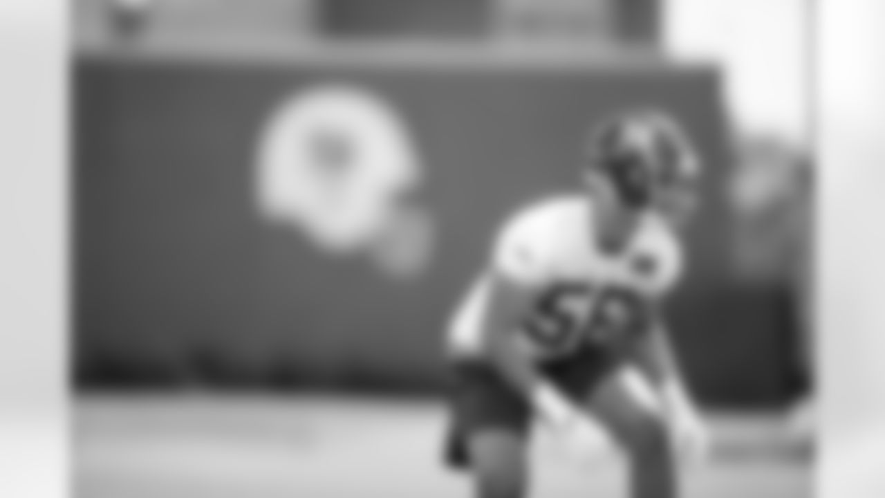 LB Elerson Smith (58)