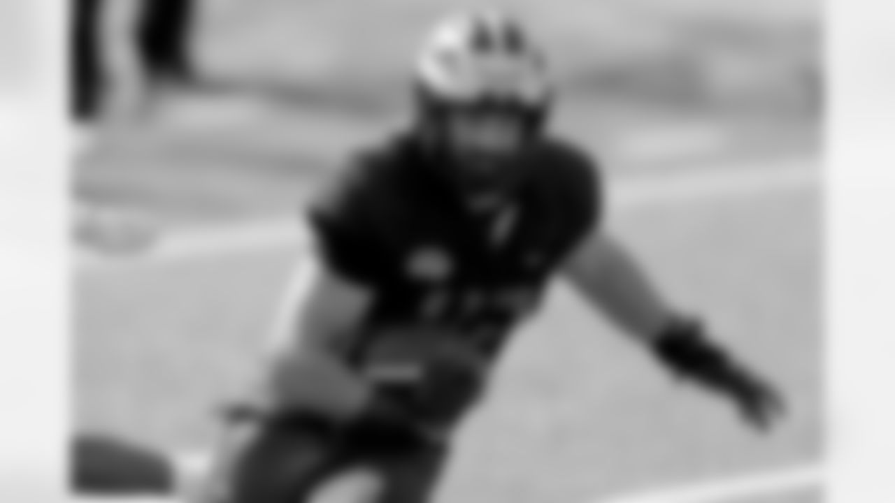 National Team fullback Ben Mason of Michigan (42) runs the ball during the National team practice for the NCAA college Senior Bowl in Mobile, Ala., Wednesday, Jan. 27, 2021. (AP Photo/Rusty Costanza)