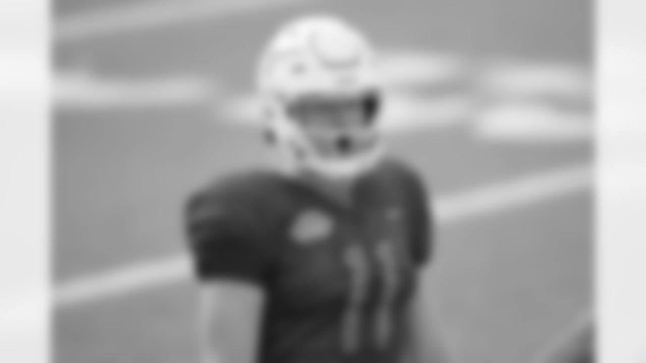 National Team quarterback Sam Ehlinger of Texas (11) yells during the National Team practice for the NCAA Senior Bowl college football game in Mobile, Ala. Wednesday, Jan. 27, 2021. (AP Photo/Matthew Hinton)