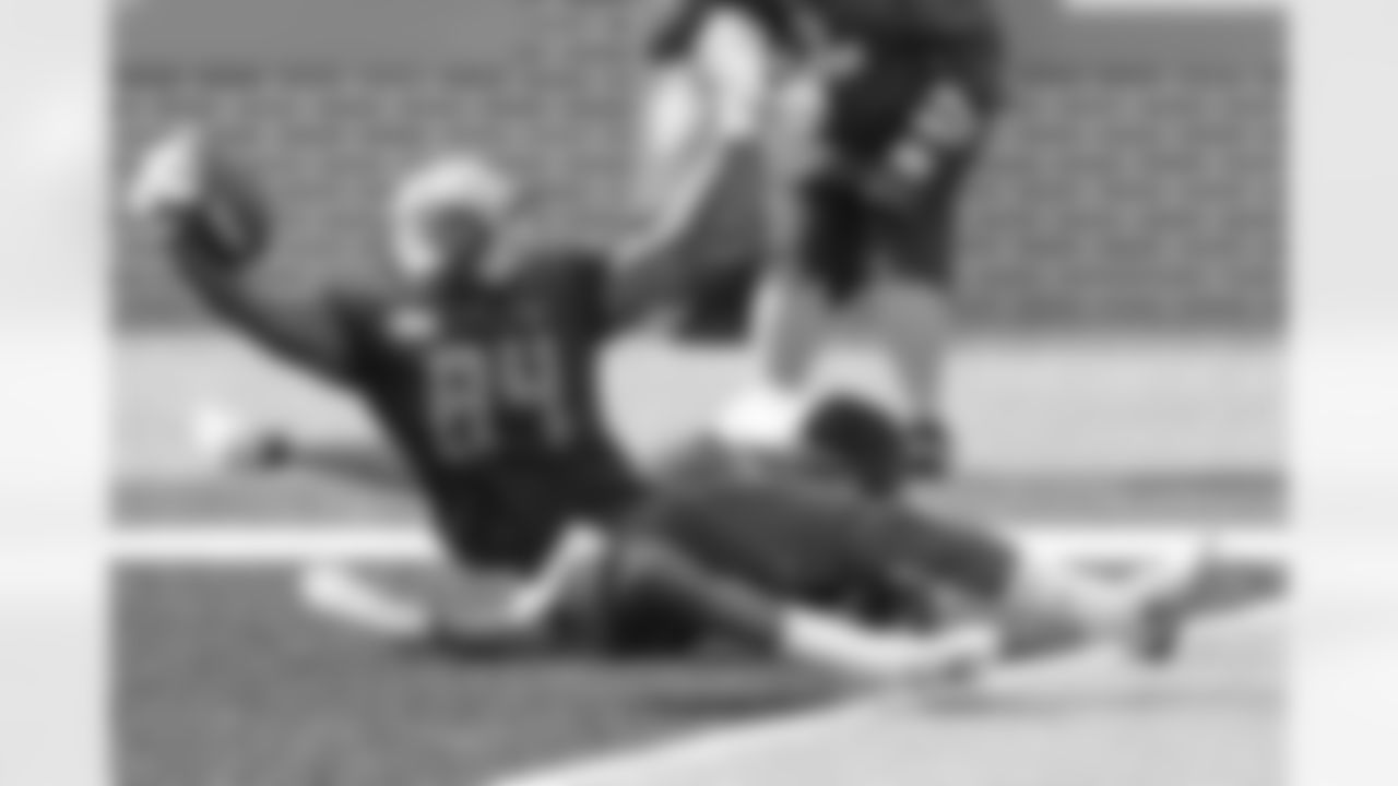 National Team wide receiver Frank Darby of Arizona State (84) makes a touchdown during practice for the Senior Bowl NCAA college football game in Mobile, Ala., Wednesday, Jan. 27, 2021. (AP Photo/Matthew Hinton)