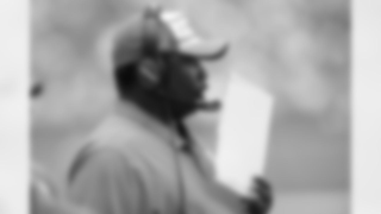 Miami Dolphins defensive coordinator Patrick Graham talks on his headsets from the sideline during an NFL football game against the New England Patriots, Sunday, Sept. 15, 2019 in Miami Gardens, Fla. The Patriots defeated the Dolphins 43-0. (Paul Spinelli via AP)
