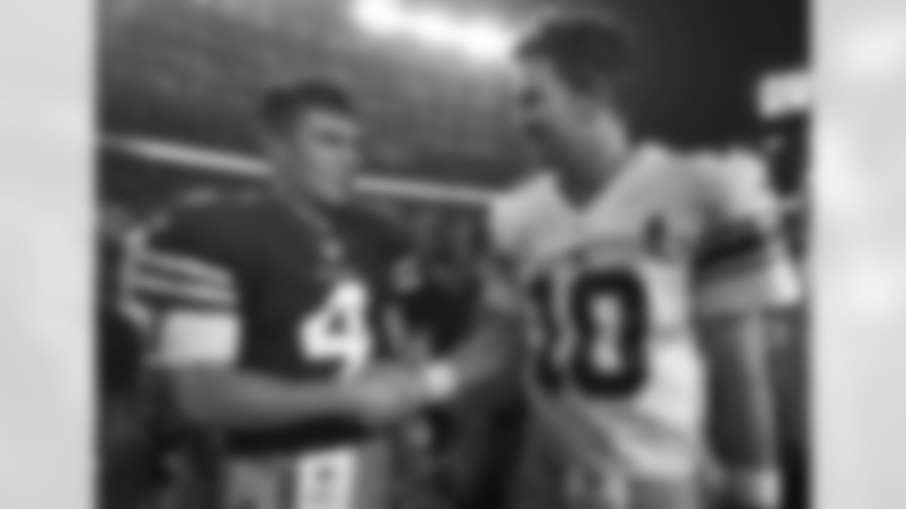 San Francisco 49ers quarterback Nick Mullens (4) shakes hands with New York Giants quarterback Eli Manning (10) after an NFL football game in Santa Clara, Calif., Monday, Nov. 12, 2018. (AP Photo/Ben Margot)
