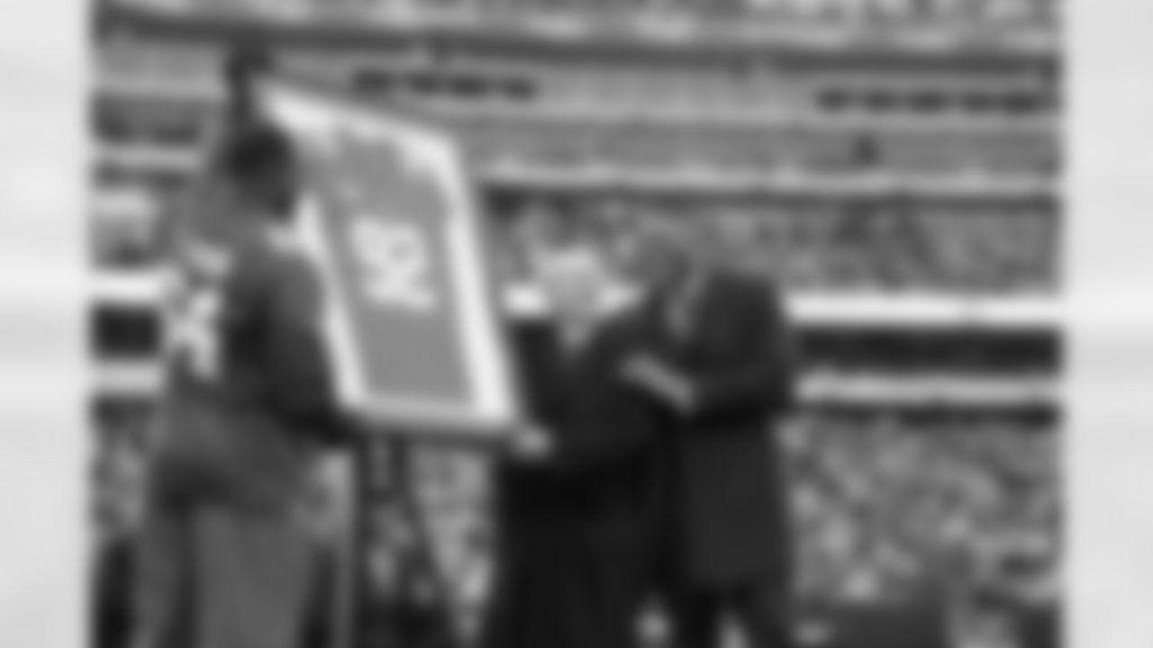 Jessie Armstead and Tom Coughlin show off Michael Strahans framed Jersey during a week 12 football game against the Philadelphia Eagles on Sunday November 28th, 2021 in East Rutherford, New Jersey