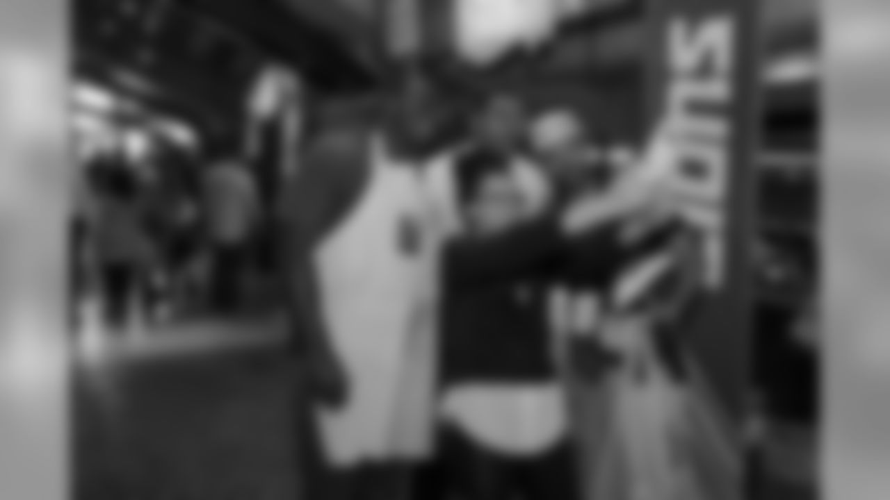 Fans take a selfie with Tre Lamar and Anthony Pittman at Taste of the Lions on Wednesday, May 15, 2019 in Detroit.