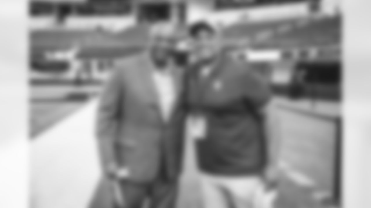 DeMarco Farr of the Los Angels Rams greets assistant general manager Ray Agnew of the Detroit Lions before playing in an NFL Football Game, Sunday, Oct. 24, 2021, in Inglewood, CA. The Rams won 28-19. (Jeff Lewis/LA Rams)