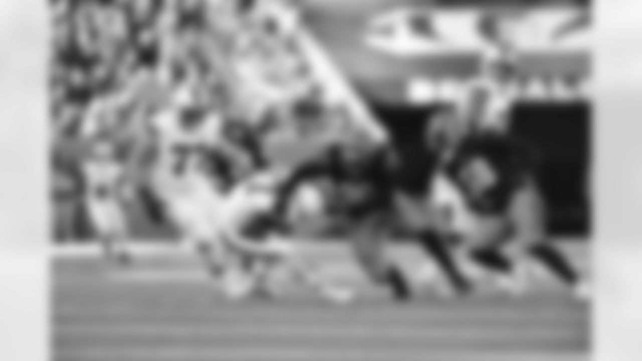 DT Kris Jenkins Jr. sacks QB Dorian Thompson-Robinson against the Browns in Week 16, Sunday, December 22, 2024.