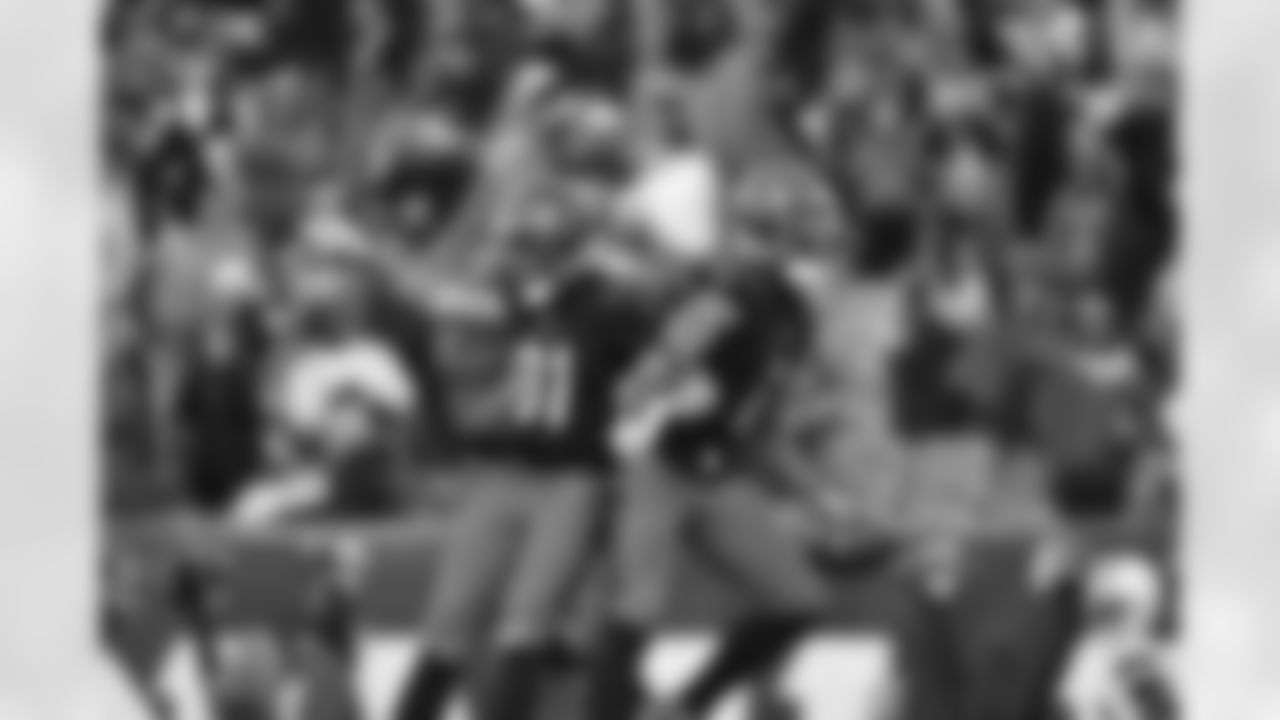 WRs Ja'Marr Chase and Jermaine Burton celebrate Chase's fourth-quarter touchdown in Week 16 against the Browns, Sunday, December 22, 2024.