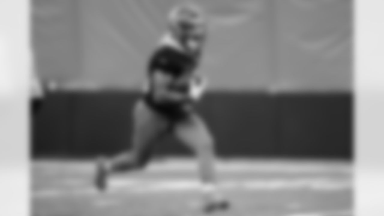 RB Chase Brown runs the ball during practice, Thursday, December 6, 2024.