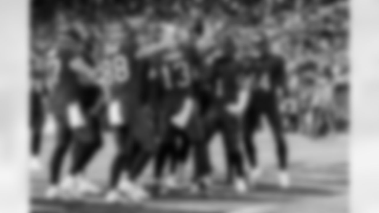 TAMPA, FL - December 24, 2023 - Running Back Rachaad White #1, Wide Receiver Chris Godwin #14, Wide Receiver Mike Evans #13, and Tight End Cade Otton #88 of the Tampa Bay Buccaneers during the game between the Jacksonville Jaguars and Tampa Bay Buccaneers. The Bucs won the game, 30-12. Photo By Tori Richman/Tampa Bay Buccaneers
