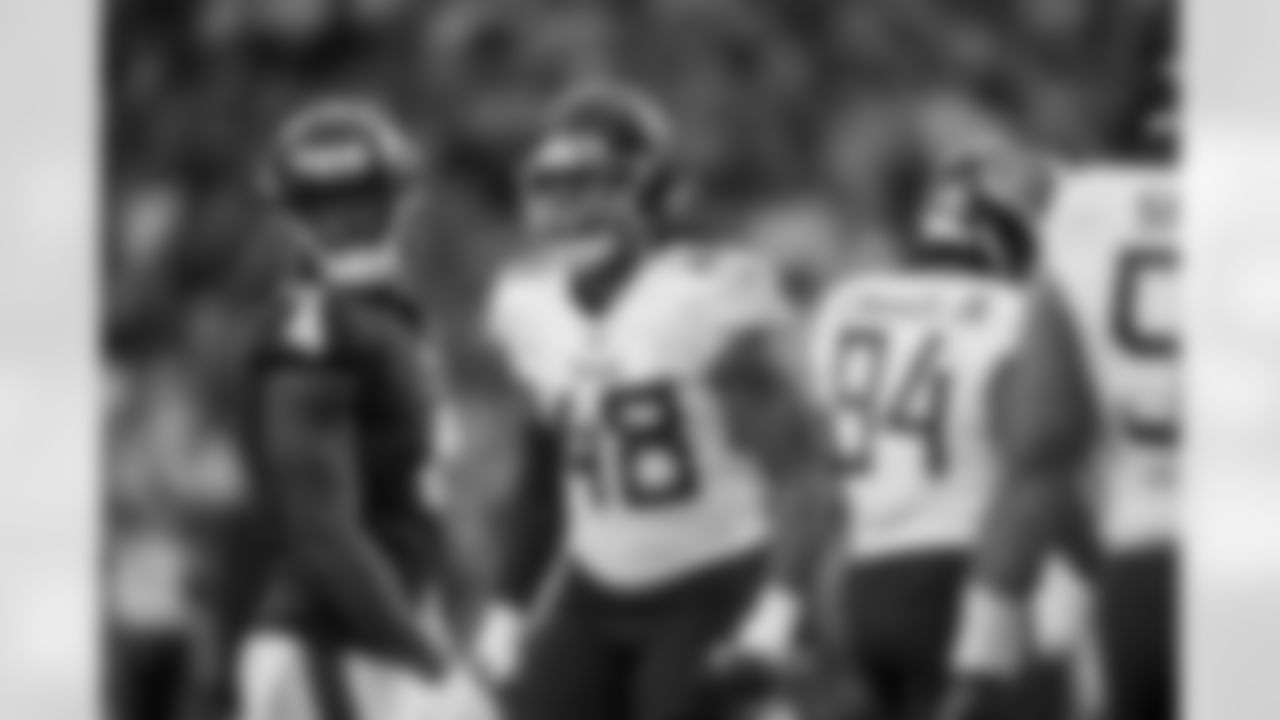 Tennessee Titans linebacker Bud Dupree (48) yells after a play against the Houston Texans during the second half of an NFL football game Sunday, Oct. 30, 2022, in Houston. (AP Photo/Eric Gay)