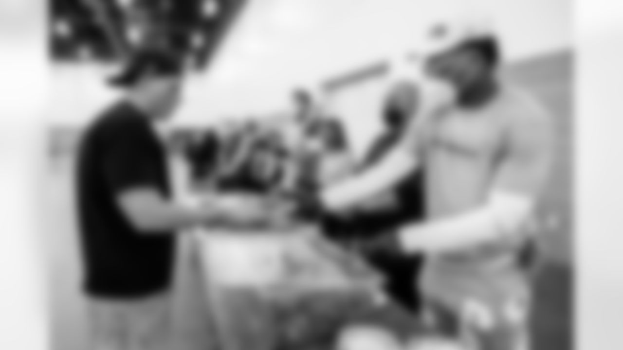 The Los Angeles Chargers distribute meals to people displaced by the recent fires on Wednesday, February 5, 2025 at Pasadena Civic Auditorium in Pasadena, CA.