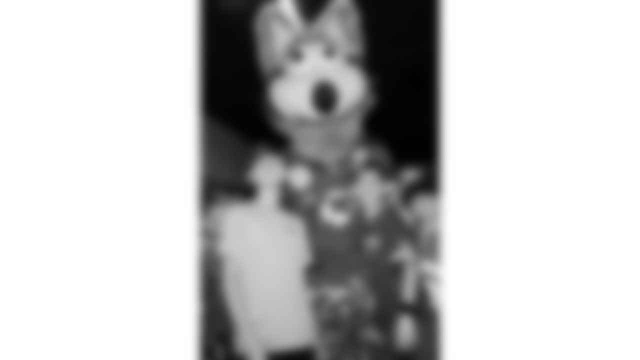 KC Wolf and fans pose for a photo on Opening Night at Caesars Superdome ahead of Super Bowl LIX on Monday, February 3, 2025.