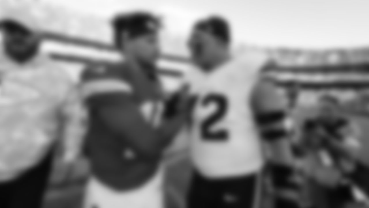 Kansas City Chiefs quarterback Patrick Mahomes (15) shakes hands with Garett Bolles following the Week 10 NFL Game against the Denver Broncos on Sunday, November 10, 2024.