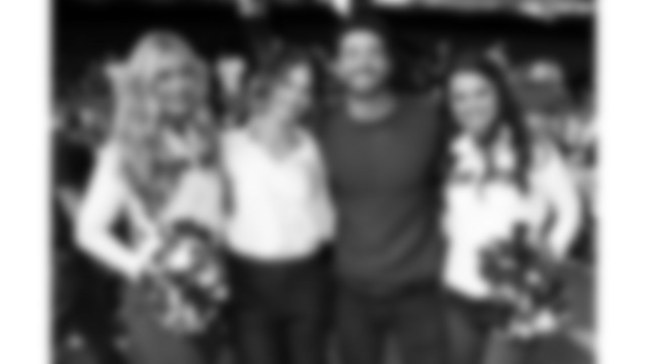 Kansas City Chiefs Cheerleaders pose for a photo with Kelsey Anderson and Joey Graziadei on Opening Night at Caesars Superdome ahead of Super Bowl LIX on Monday, February 3, 2025.