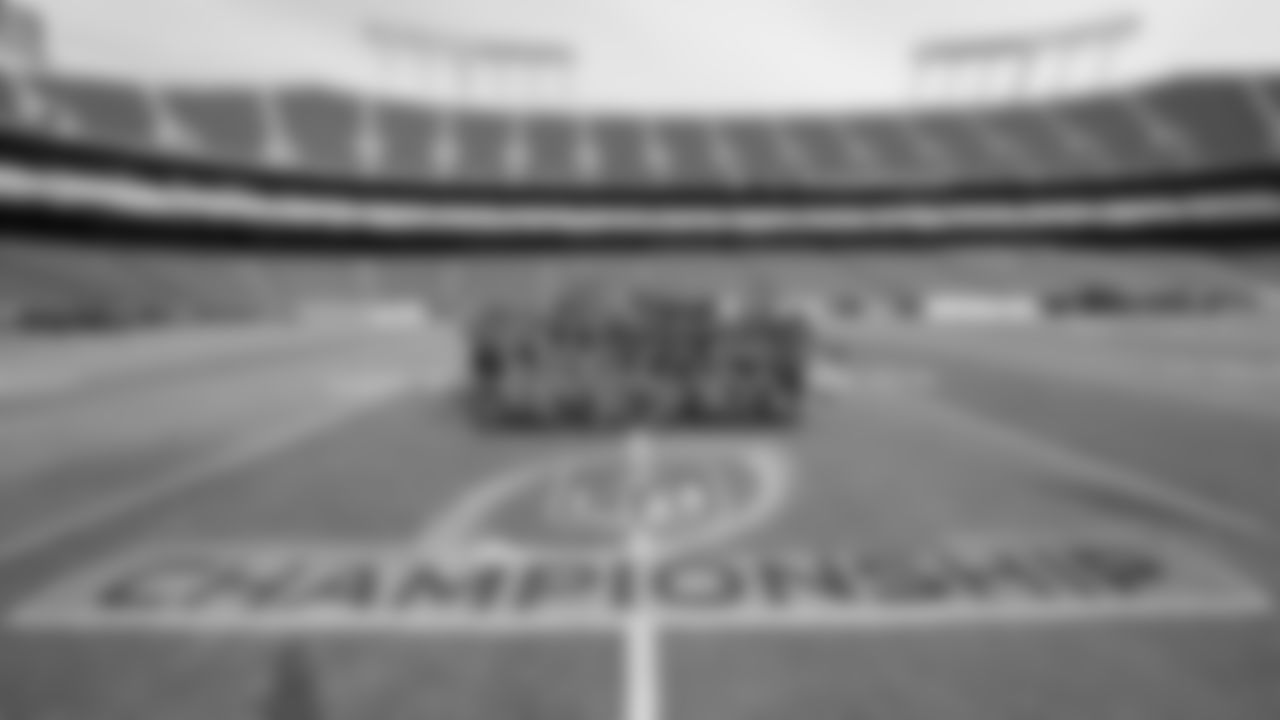 The Kansas City Chiefs Cheerleaders pose for a photo around the Championship logo prior to the AFC Championship Game on Sunday, January 26, 2025 in Kansas City, MO.