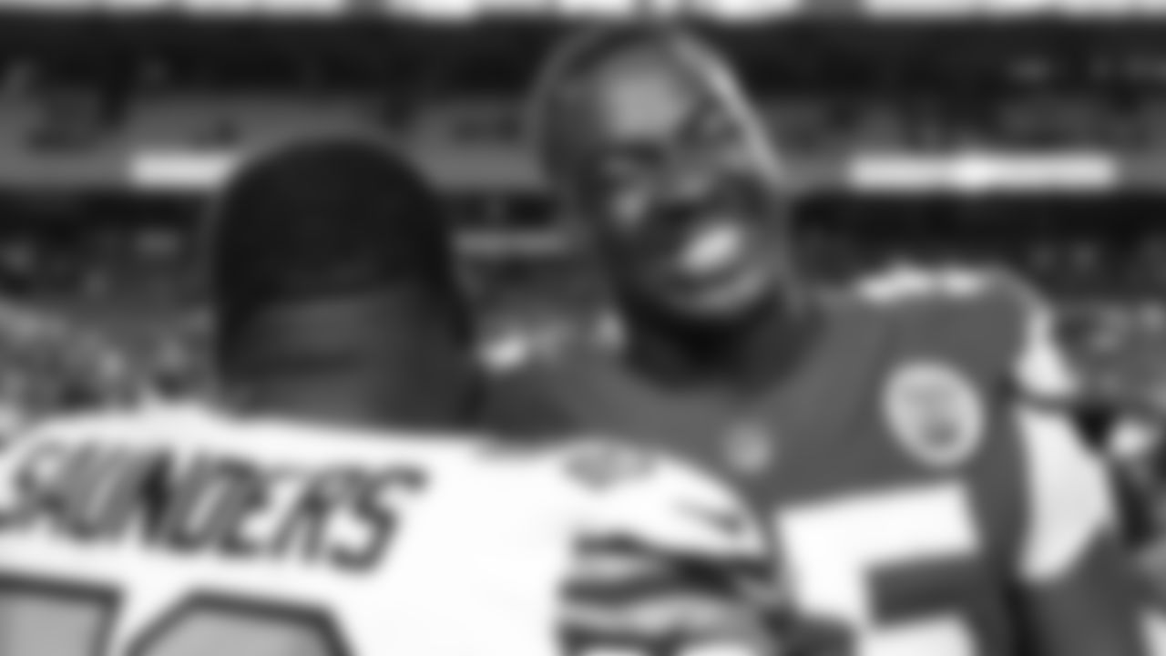 Kansas City Chiefs defensive tackle Chris Jones (95) laughs with New Orleans Saints defensive tackle Khalen Saunders (50) following an NFL football game, Monday, Oct. 7, 2024 in Kansas City, Mo.