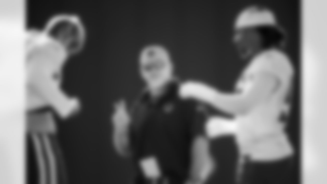 Charlie Partridge Defensive Line and DE Isaiah Land #55