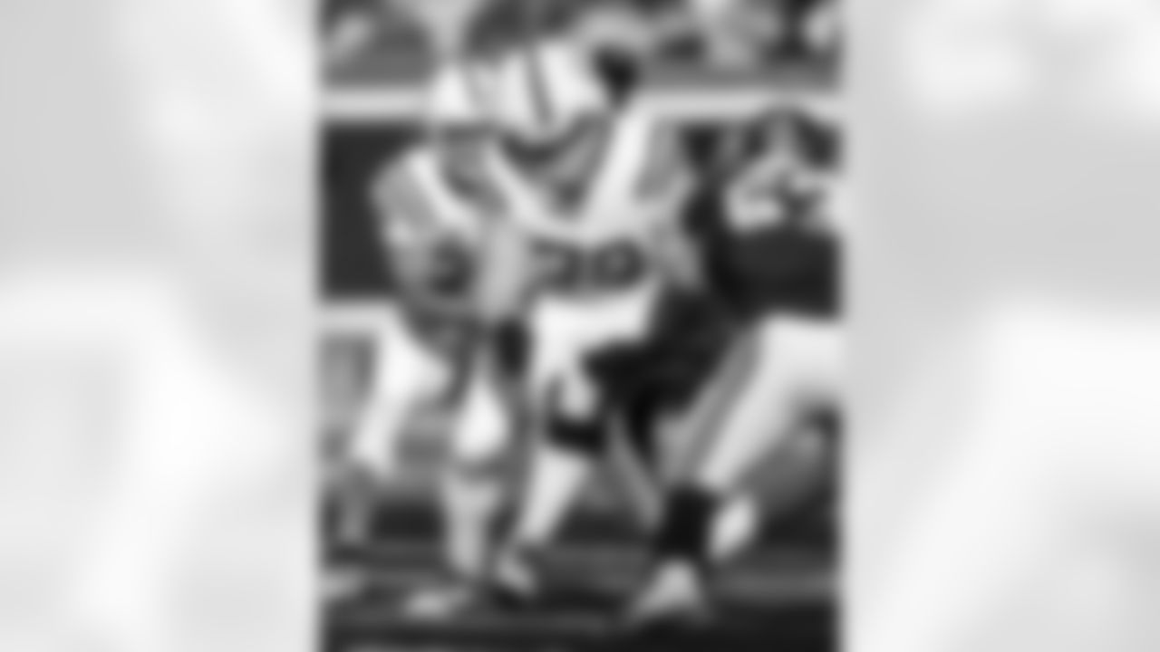 RB Jonathan Taylor #28 and T Bernhard Raimann #79