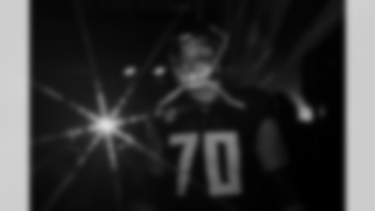 Atlanta Falcons tackle Jake Matthews #70 walks out before the Week 13 Game against the Los Angeles Chargers at Mercedes-Benz Stadium in Atlanta, Georgia on Sunday, December 1, 2024. (Photo by Brandon Magnus/Atlanta Falcons)