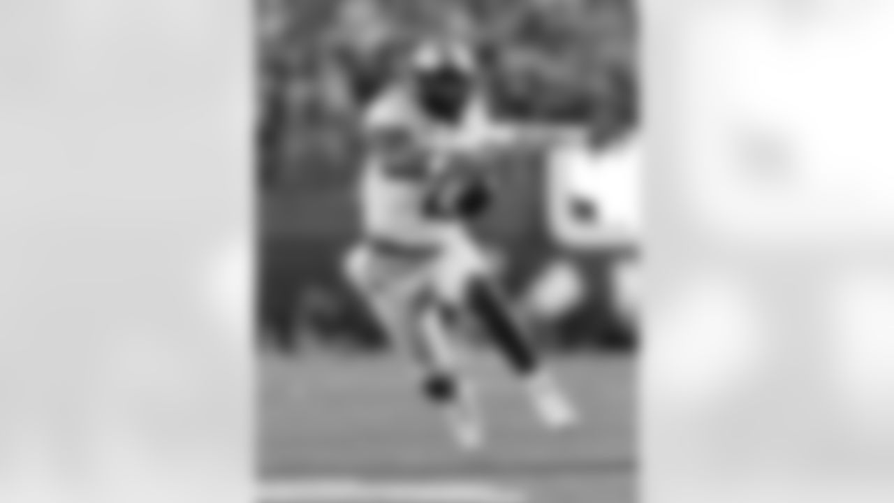 Colorado quarterback Shedeur Sanders carries the ball against Nebraska during the first half of an NCAA college football game Saturday, Sept. 7, 2024, in Lincoln, Neb. (AP Photo/Rebecca S. Gratz)