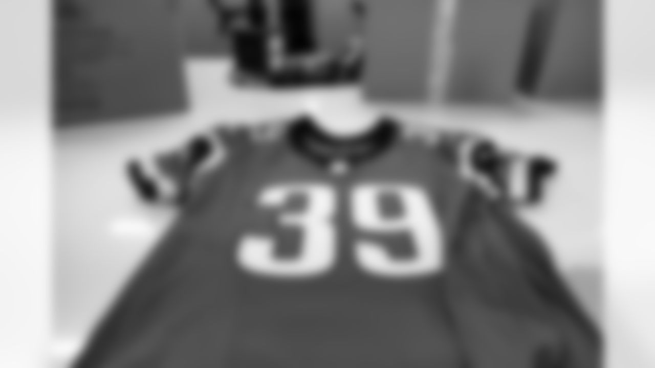 Jacksonville, Fla. — Jaguars football equipment staff prepare the "prowler" throwback uniforms in preparation for Sunday on October 2, 2024.