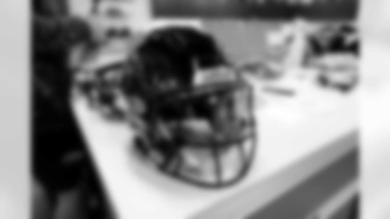 Jacksonville, Fla. — Jaguars football equipment staff prepare the "prowler" throwback uniforms in preparation for Sunday on October 2, 2024.