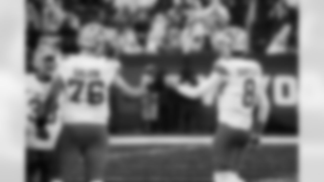Detroit Lions offensive lineman Connor Galvin (76) and Detroit Lions quarterback Nate Sudfeld (8) during an NFL preseason game against the New York Giants on Aug. 8, 2024 in East Rutherford, New Jersey (Jeff Nguyen/Detroit Lions via AP)