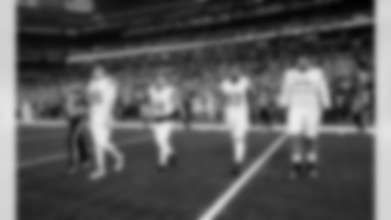 Detroit Lions quarterback Jared Goff (16), Detroit Lions wide receiver Amon-Ra St. Brown (14), Detroit Lions defensive lineman Josh Paschal (93), and Detroit Lions tackle Penei Sewell (58) before an NFL football game against the Indianapolis Colts on Nov. 24, 2024 in Indianapolis. (Jeff Nguyen/Detroit Lions via AP)