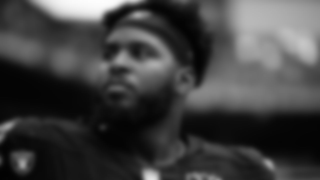 Las Vegas Raiders tackle Thayer Munford Jr. (77) during the national anthem before the regular season away game against the Miami Dolphins at Hard Rock Stadium.