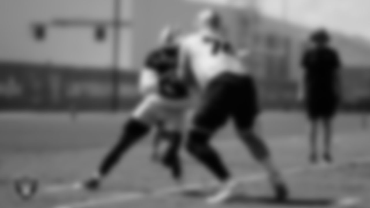 Las Vegas Raiders defensive end Janarius Robinson (97) and tackle Kolton Miller (74) during practice at Intermountain Health Performance Center.
