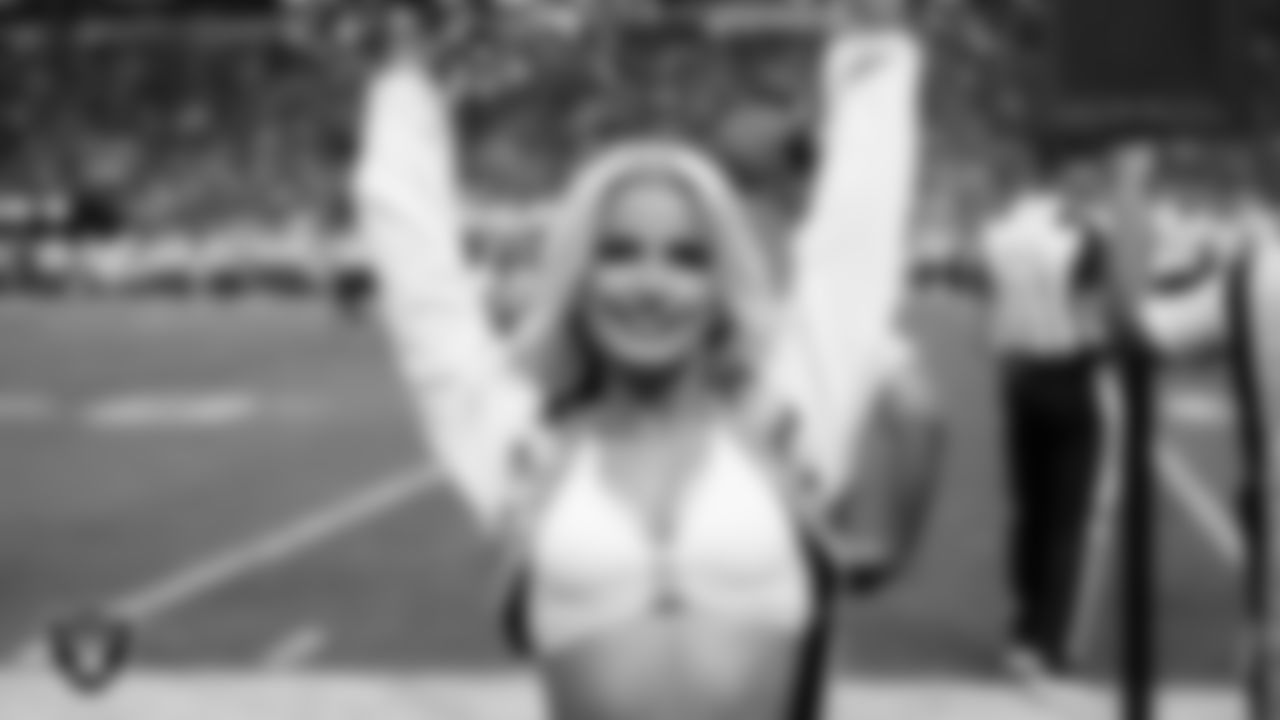 Raiderette Katie on the sidelines during the regular season home game against the Denver Broncos at Allegiant Stadium.