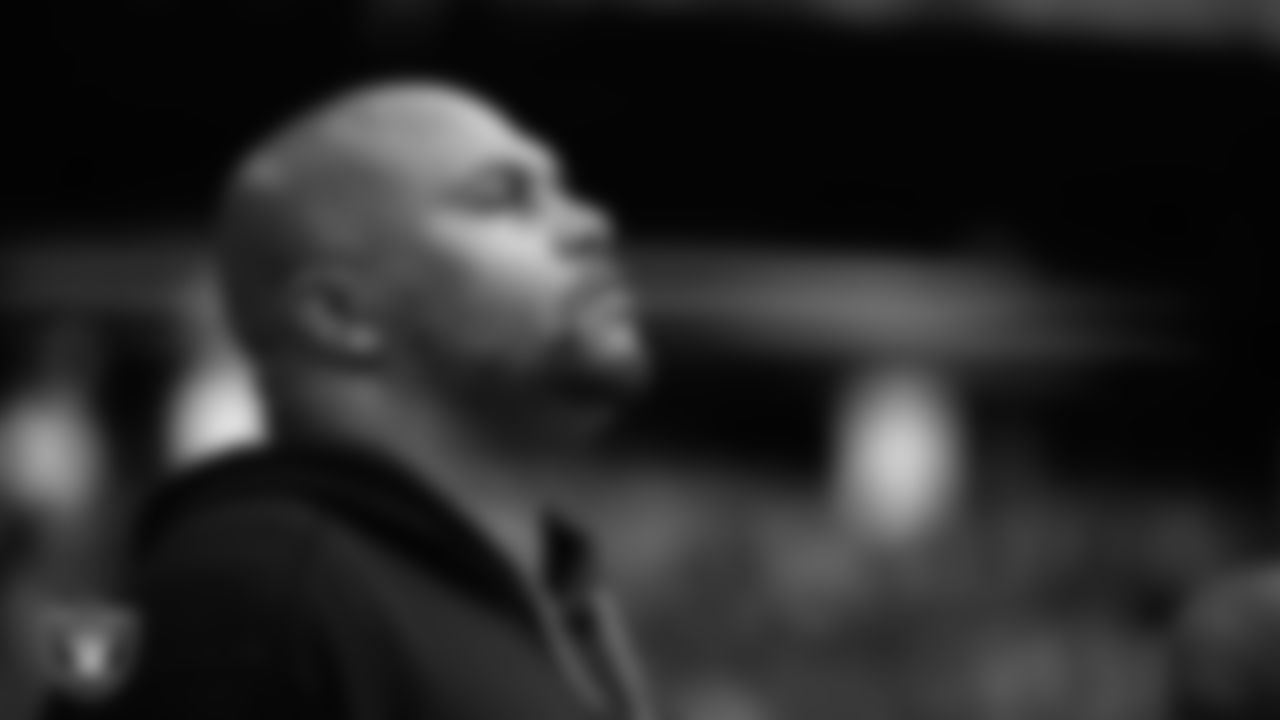 Las Vegas Raiders Head Coach Antonio Pierce during the national anthem before the regular season away game against the Miami Dolphins at Hard Rock Stadium.