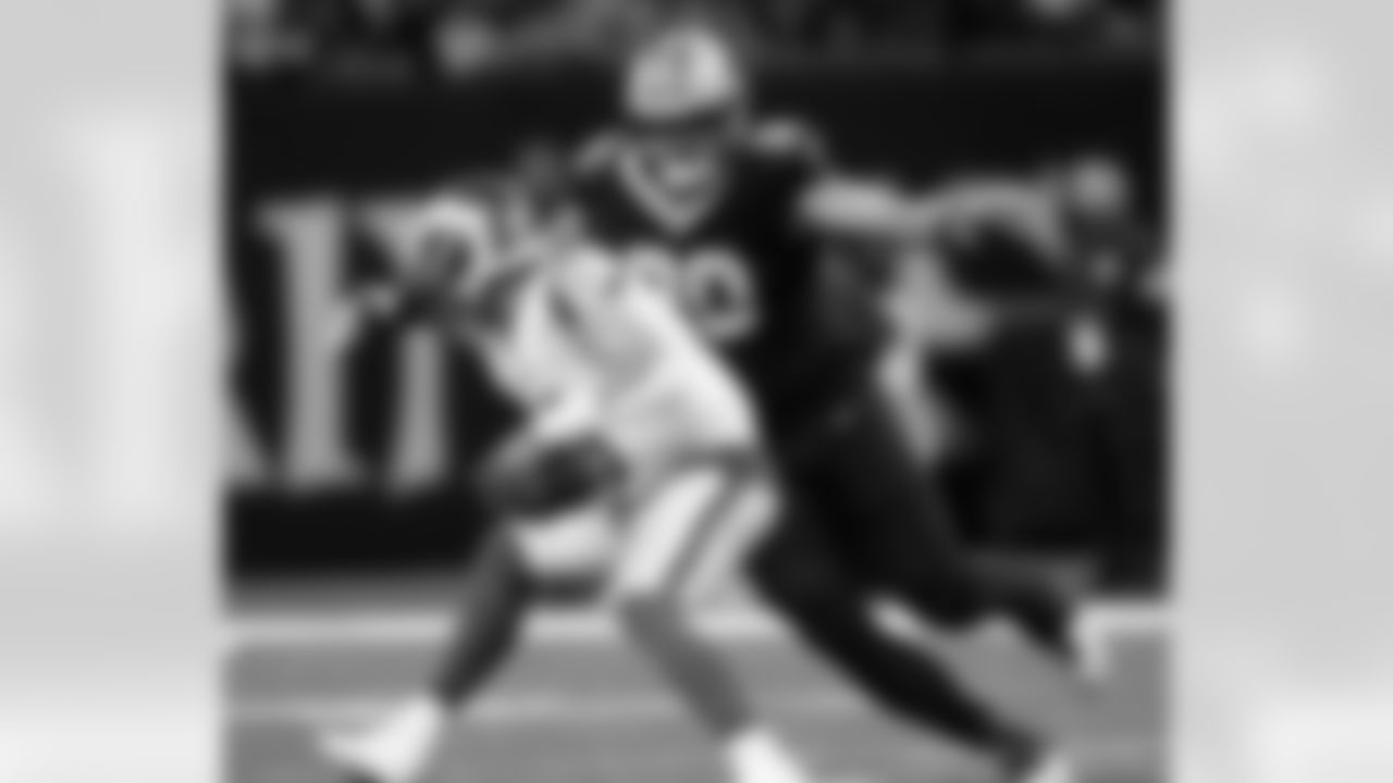 DT Bryan Bresee (90) makes a tackle during the New Orleans Saints game against the Los Angeles Rams for Week 13 of the 2024 NFL Season on Dec. 1, 2024 at Caesars Superdome.