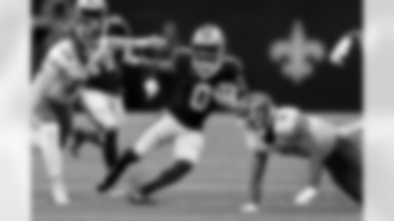 New Orleans Saints safety Ugo Amadi (0) makes a second quarter interception during a preseason NFL game against the Kansas City Chiefs, Sunday, Aug. 13, 2023 in New Orleans.