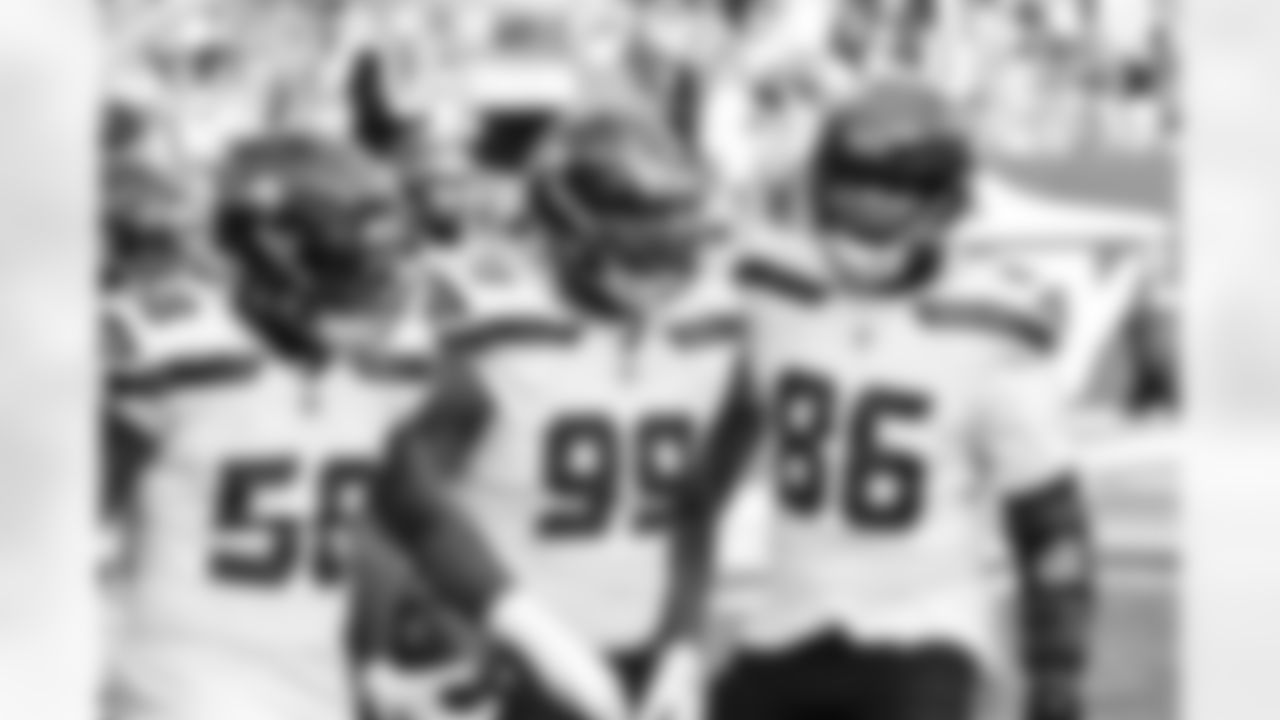 Seahawks linebacker Derick Hall (58), Seahawks defensive end Leonard Williams (99) and Seahawks tight end Pharaoh Brown (86) at the Week 13 matchup against the New York Jets at MetLife Stadium on Sunday, December 1, 2024.