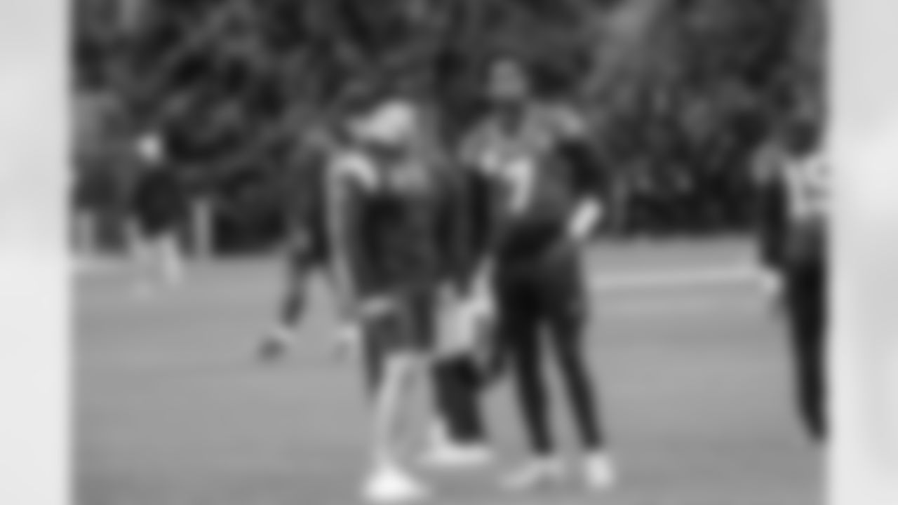 Seahawks quarterback Geno Smith (7) with offensive coordinator Ryan Grubb at practice at the Virginia Mason Athletic Center in Renton, Wash. on August 22, 2024.